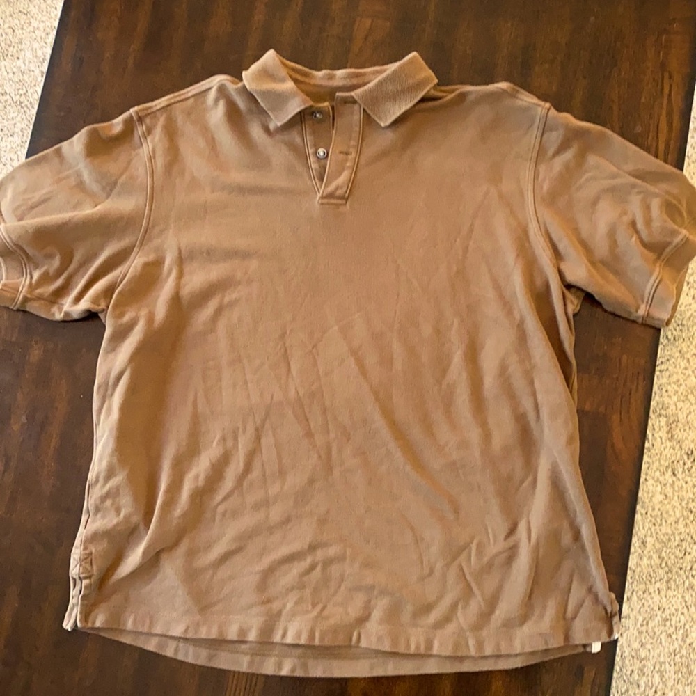 Tommy Bahama’s short sleeve cotton polo XL in a brown color.2 button